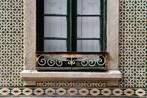 The exterior tiled houses of Ilhavo and both functional, in the preservation of the house, and artistically beautiful.